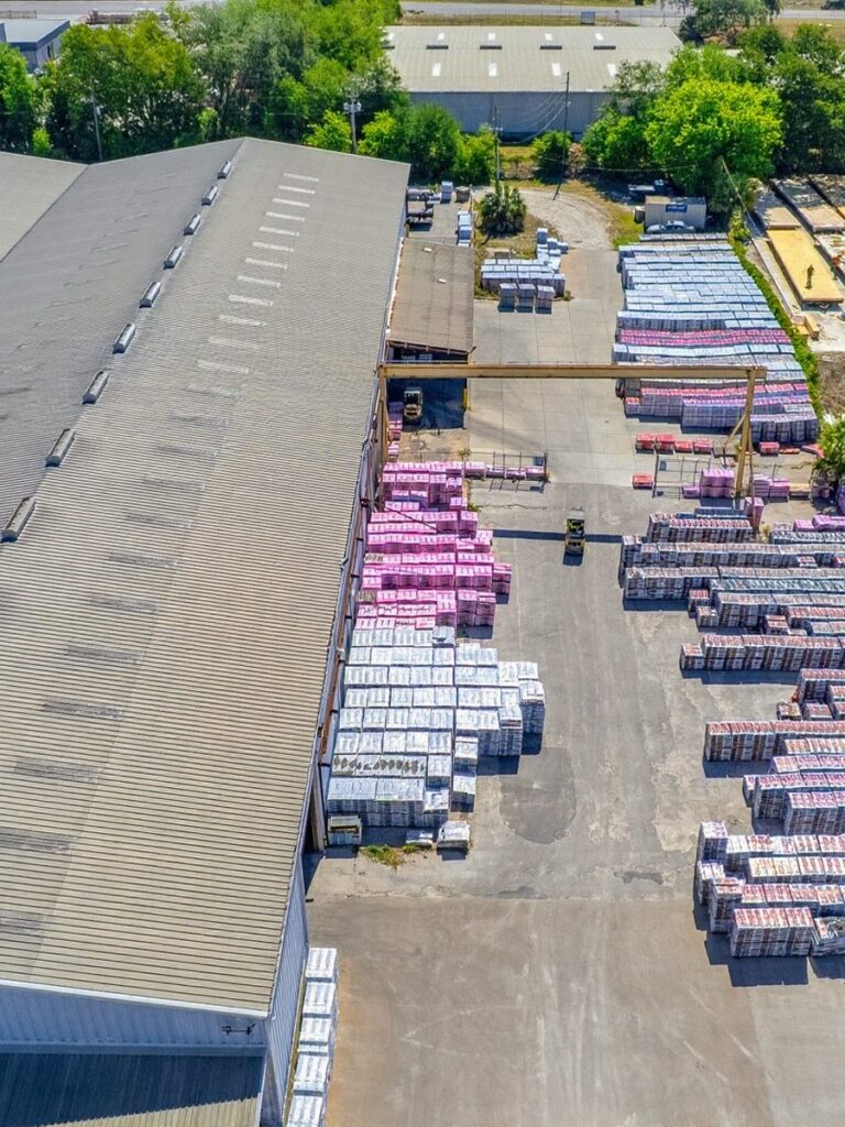 Overhead drone view of a Florida commercial supply yard and inventory